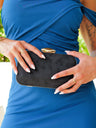 Cartera de mano horizontal ovalada negra
