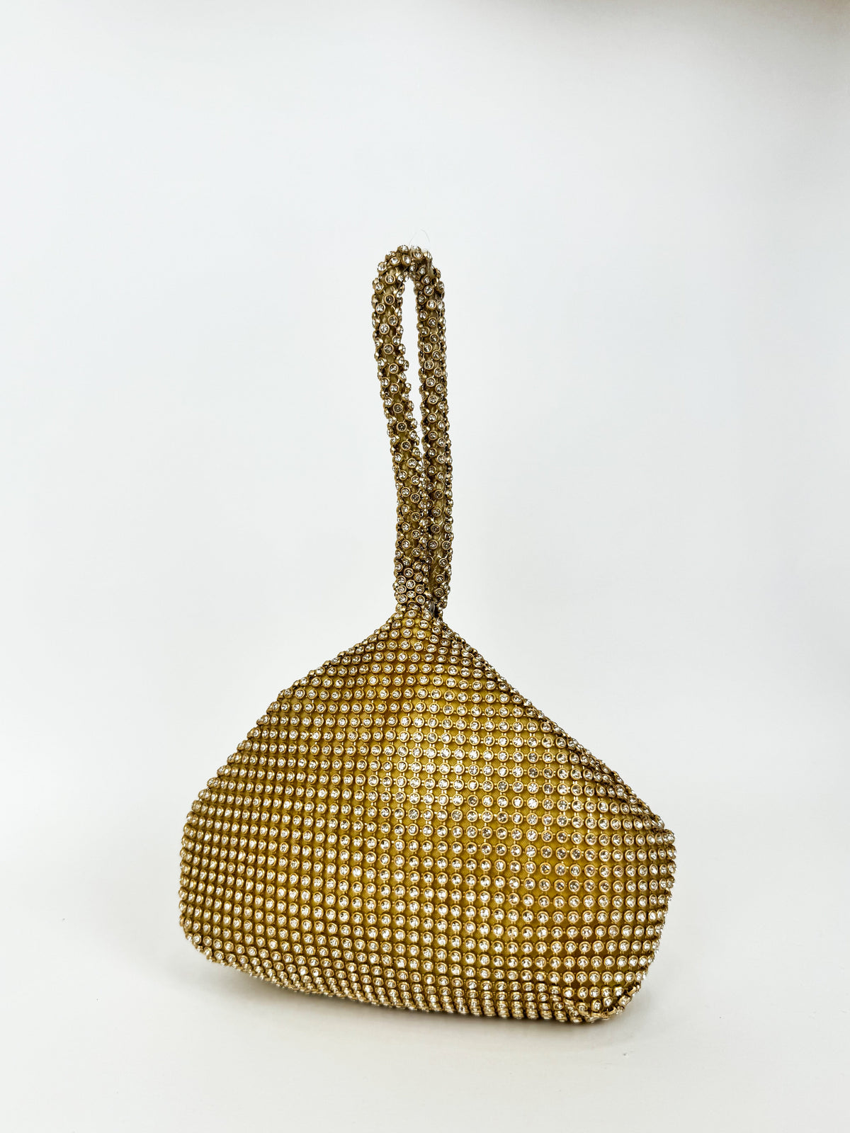 Bolsa de mão com brilhos dourados