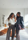 Pantalones anchos marrones con tachuelas