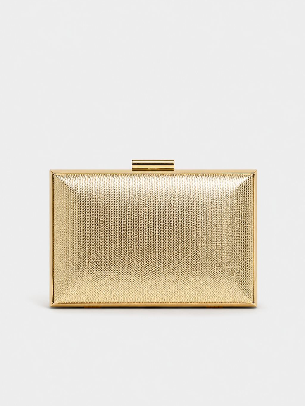 Clutch com textura dourada
