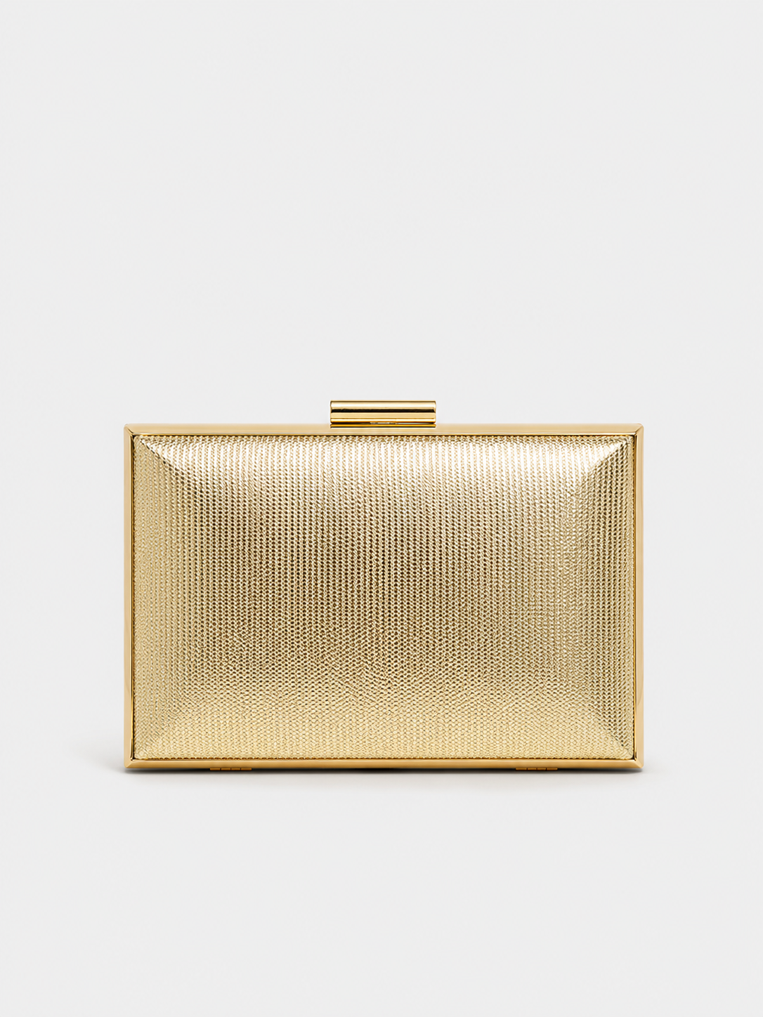 Clutch com textura dourada