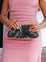 Cartera de mano en forma de cajita de bombones con lentejuelas, negra