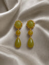 Pendientes en cascada con dijes en forma de gota y piedras verdes