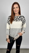 Jersey de punto gris con estampado de leopardo