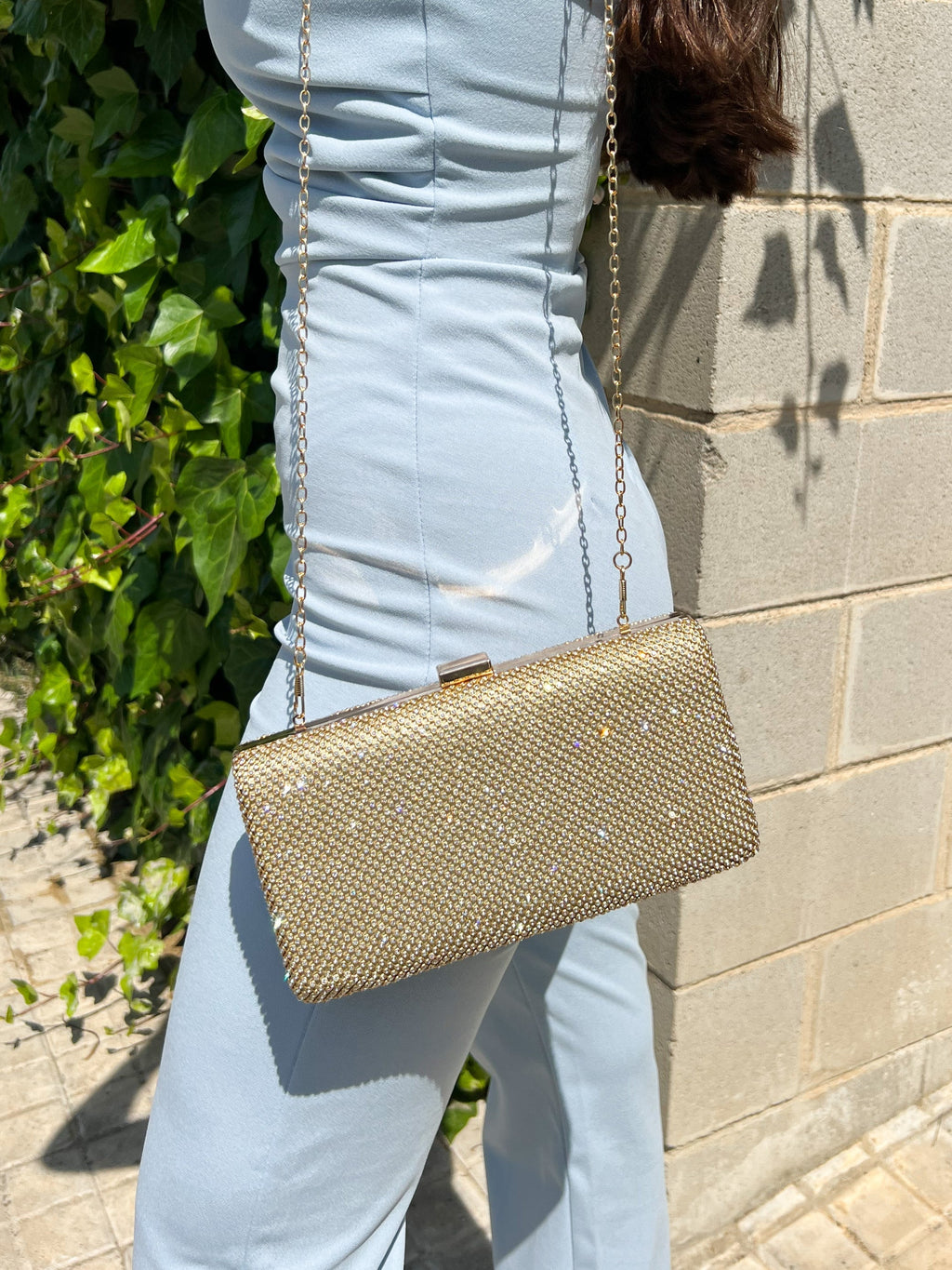 Clutch com brilhos dourados com efeito