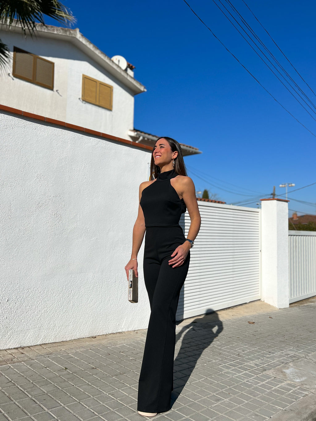 Macacão preto de crepe com decote halter